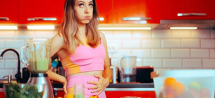 Bloated stomach showing visible abdominal swelling and digestive discomfort symptoms